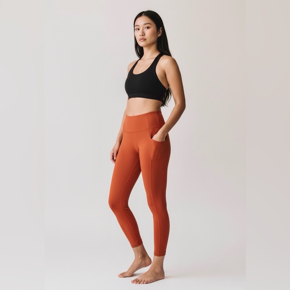REI Women's High-Waisted Burnt Orange Leggings with Pockets. Size X-Small